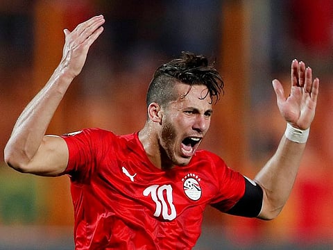 Egypt's Ramadan Sobhy celebrates scoring their second goal.