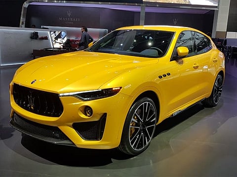 The slick maserati Levante is gorgeous and eye-catching in a canary yellow hue