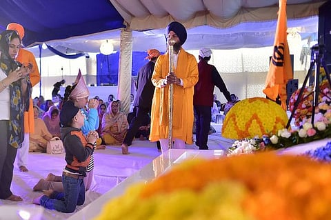 Sikhs residing in Dubai pray at the 550th Birth Anniversary of Guru Nanak Dev Ji on 12th November, 2019. Photo Clint Egbert/Gulf News