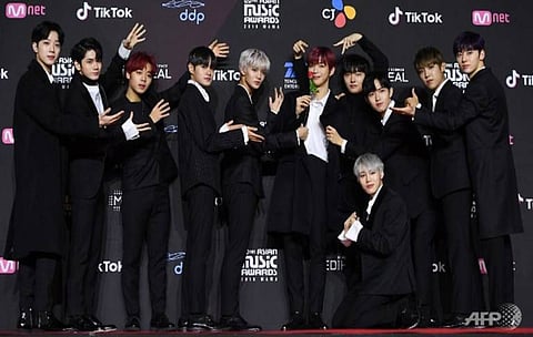 Members of South Korean boyband Wanna One pose on the red carpet at the Mnet Asian Music Awards (MAMA) in Seoul on Dec 10, 2018.