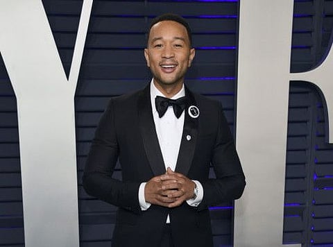 John Legend arrives at the Vanity Fair Oscar Party on Sunday, Feb. 24, 2019, in Beverly Hills, Calif.