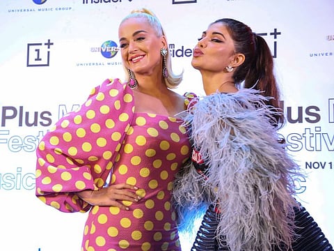 Mumbai: Internationnal Pop star Katy Perry with Bollywood actress Jacqueline Fernandez during a media conference before her concert at One Plus Music Festival in Mumbai, Tuesday, Nov. 12, 2019. (PTI Photo)(PTI11_12_2019_000083B)