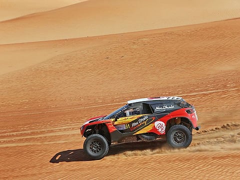 Sheikh Khalid Al Qassimi taking a commanding lead in his Abu Dhabi Racing Peugeot 2008 Dakar.
