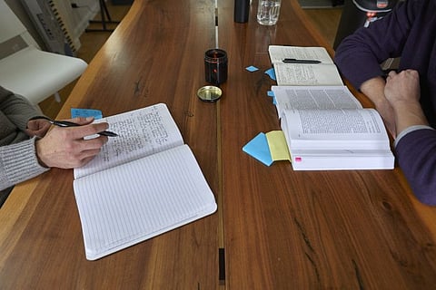James Sinka and Andrew Fleischer, quietly writing and reading while on a dopamine fast, in their apartment in San Francisco on Oct. 16, 2019.