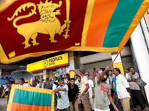 People celebrate after the voting ended during the presidential election day in Colombo, Sri Lanka November 16, 2019.