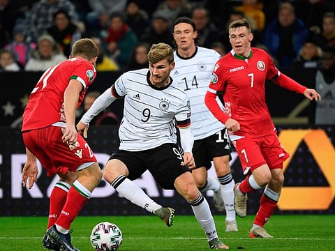Germany's Timo Werner (second left) vies for the ball with Belarus' Sergey Matvejchik during the Uefa Euro 2020 qualifiying match in Moenchengladbach.