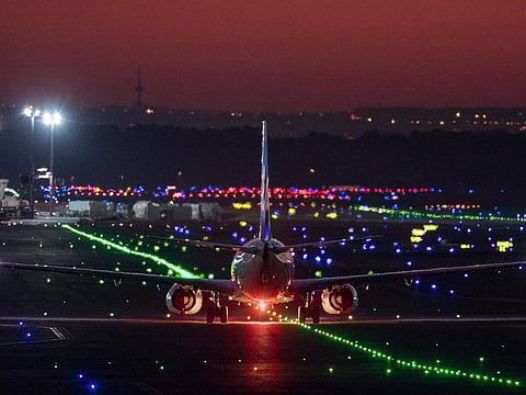 A file picture taken on March 21, 2019 shows a passenger aircraft landing at Frankfurt am Main airport, western Germany. An Air Namibia plane collided with a Korean Air jet after landing at Frankfurt airport on Novemberg 16, 2019 in the evening, but officials said no one was injured.