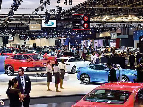 Car enthusiasts at the Dubai international motor show 2017.