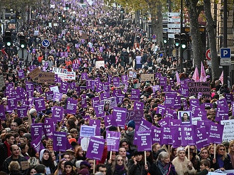 People take part in a protest to condemn violence against women, on November 23, 2019, in Paris.