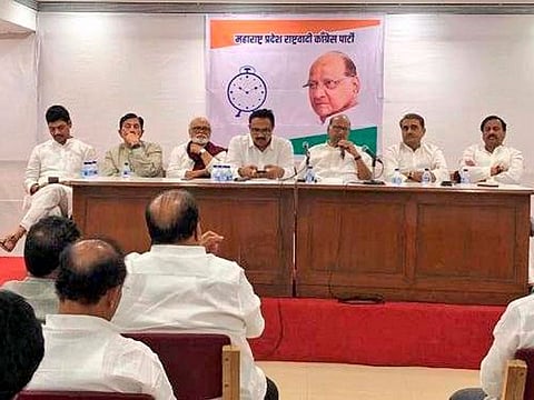 Nationalist Congress Party chief Sharad Pawar chairs a meeting of party MLA's at YB Chavan Centre in Mumbai, Saturday, Nov. 23, 2019.