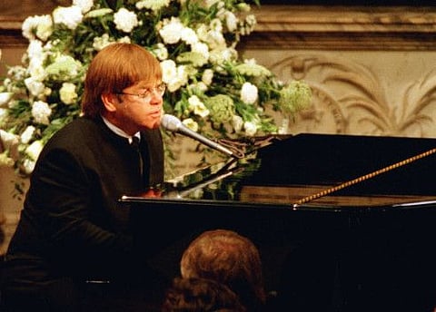 Elton John sings a rewritten version of his song 'Candle in the wind' as a tribute to Diana, Princess of Wales at her funeral in London's Westminster Abbey, September 6, 1997.