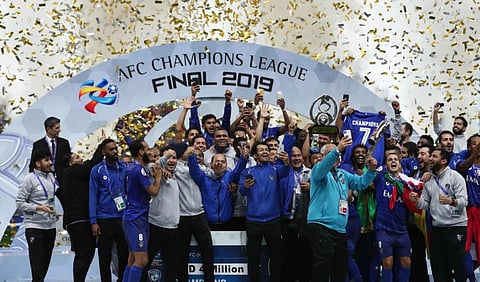 Members of Al Hilal squad celebrate their victory in the Asian Club Championship in Saitama, Japan today.