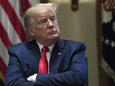 President Donald Trump listens during a meeting in the Cabinet Room of the White House in Washington, Friday, Nov. 22, 2019
