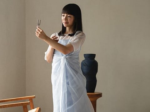In an undated handout image, Marie Kondo — the tidying guru, publishing juggernaut and former Shinto shrine maiden — with a tuning fork and crystal (together they retail for $75) from her e-shop. Her new online store honors her brand’s ethos: that objects can make people happy.