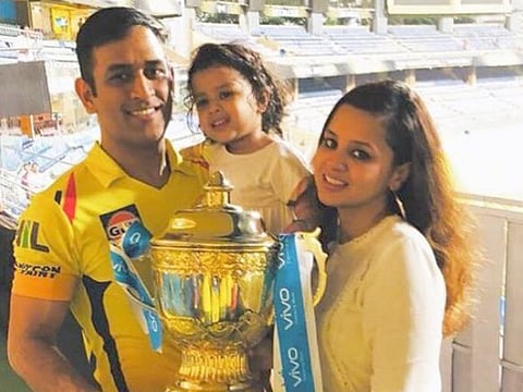 MS Dhoni with wife Sakshi and daughter Ziva.