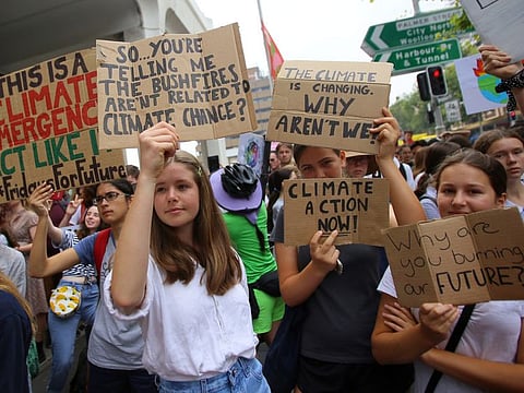 Student activists from School Strike for Climate Australia (SS4C) hold a 'Solidarity Sit-down' outside of the office of the Liberal Party of Australia in Sydney, Australia, November 29, 2019.