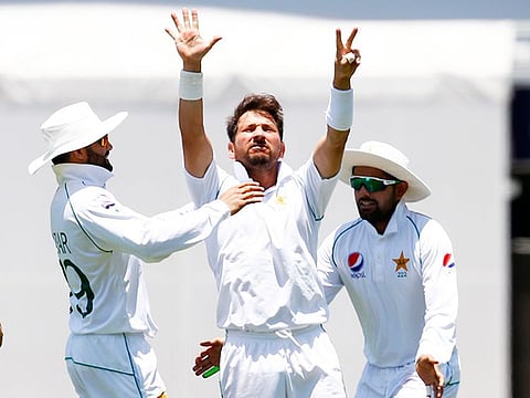 File photo: Pakistan's Yasir Shah, centre, celebrates after he got the wicket of Australia's Steve Smith during their cricket test match in Brisbane, Australia, Saturday, Novovember 23, 2019.