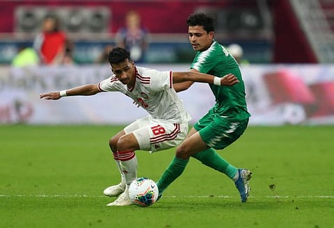 United Arab Emirates (white), who lost their last group game against Iraq, need to raise the intensity against Asian Cup champions in a high-stake game on Monday.