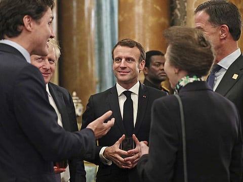 Canadian Prime Minister Justin Trudeau, Prime Minister Boris Johnson, French President Emmanuel Macron and Jens Stoltenberg (partly obscured), Nato Secretary General, during a reception at Buckingham Palace, London, as Nato leaders attend to mark 70 years of the alliance