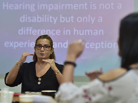 Colette A. teaches sign language to people on 19th October 2019. Photo Clint Egbert/Gulf News
