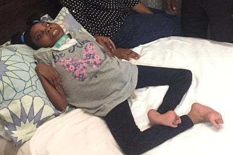 Lisa Foko with parents Agatha and Square. Lisa’s family need help for her upkeep after her father lost his job.
Image supplied