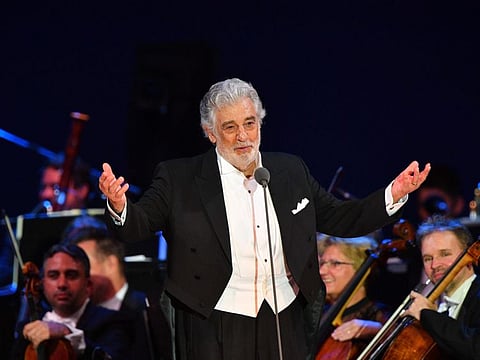 In this file photo taken on August 28, 2019 Spanish tenor Placido Domingo performs during his concert in the newly inaugurated sports and culture centre 'St Gellert Forum' in Szeged, southern Hungary.