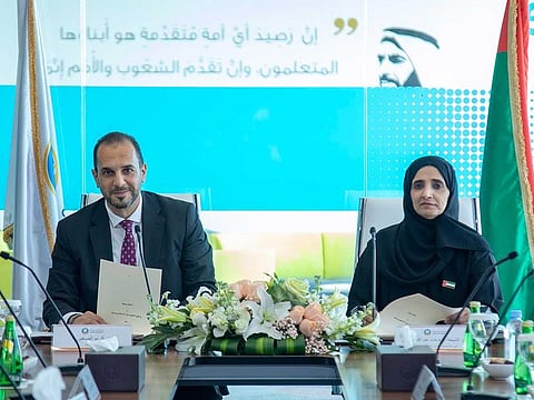 Ajman University Chancellor Dr Karim Seghir and Sheikha Azza bint Abdullah Al Nuaimi, Director General of the Humaid bin Rashid Al Nuaimi Charity Foundation, at the MoU signing ceremony to offer 30 per cent discount to deserving students.