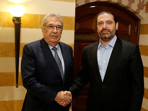 Samir Khatib, who withdrew his candidacy to lead a government, meets with Lebanon's caretaker Prime Minister Saad al-Hariri in Beirut Lebanon December 8, 2019.