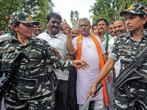 Yeshwanthpur's BJP candidate ST Somashekar flashes victory sign after winning by-polls, in Bengaluru, Monday, Dec. 9, 2019