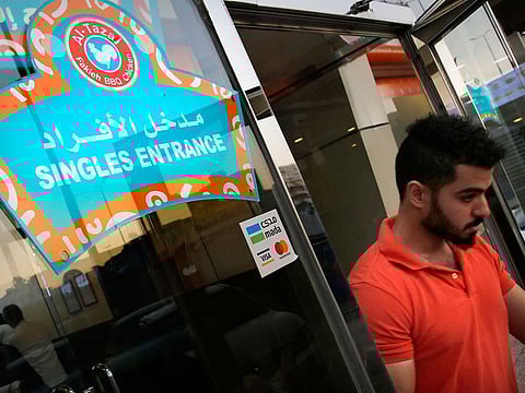 A man leaves the "single section" in Jeddah, Saudi Arabia, Sunday, Dec. 8, 2019.