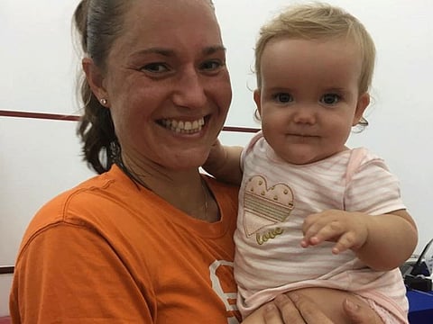 Kateryna Bondarenko poses with her second child at the Al Habtoor tennis event on Tuesday.