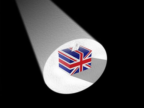 British voters have been asked to elect a new parliament with the Christmas lights twinkling in shop windows and carols in the air