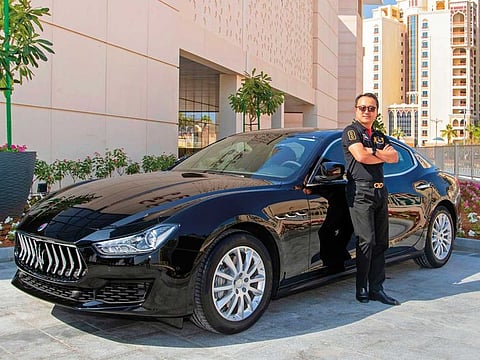 Rui Guo with his Maserati, which he won at Nakheel Mall.