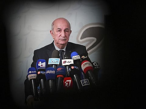 In this Nov.24, 2019 file photo, Presidential candidate for the upcoming Dec. 12, presidential election Abdelmajid Tebboune gives a press conference, in Algiers.