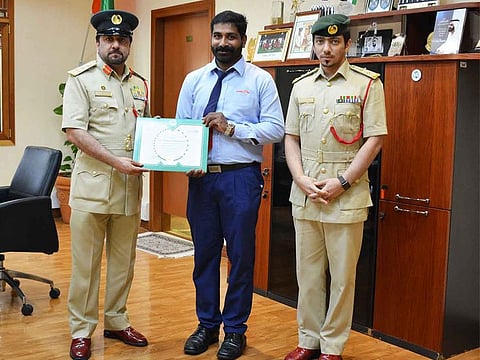 Dubai Police with the honest bus driver