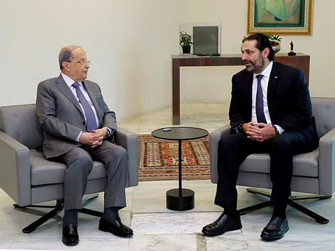 Lebanese President Michel Aoun (L) meeting with caretaker prime minister Saad Hariri at Baabda presidential palace, east of the capital Beirut