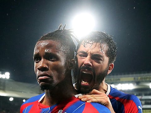 Crystal Palace's Wilfried Zaha celebrates scoring.