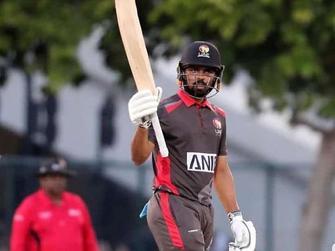 Basil Hameed celebrates his half century during the match-winning knock for UAE against Scotland