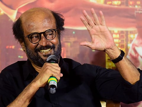 Bollywood actor Rajinikanth gestures during the trailer launch of the upcoming Hindi-Tamil-Telgu language action thriller film 'Darbar' in Mumbai on December 16, 2019. / AFP / Sujit Jaiswal