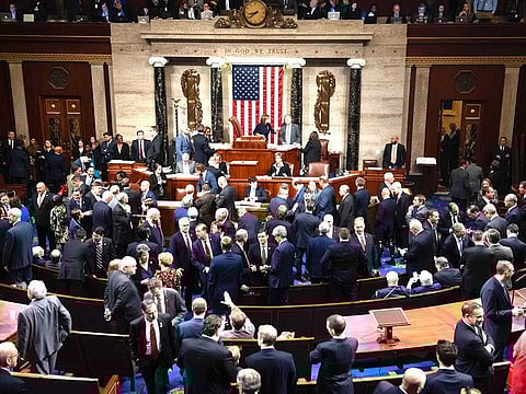 US Speaker of the House Nancy Pelosi presides over Resolution 755, Articles of Impeachment Against President Donald J. Trump as the House votes at the US Capitol in Washington, DC.