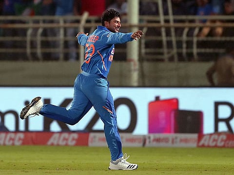 Kuldeep Yadav celebrates his hat-trick.