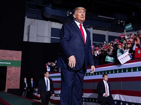 President Donald Trump arrives to speak during a campaign rally at Kellogg Arena, Wednesday, December 18, 2019, in Battle Creek, Mich.