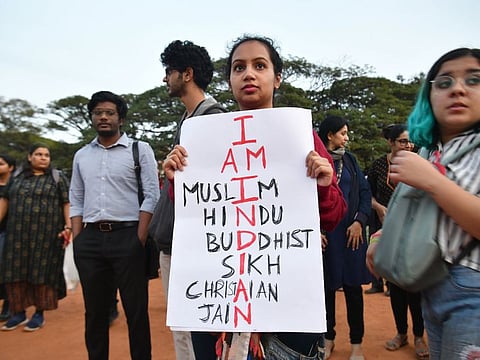 Protesters rally against India's new citizenship law in spite of a curfew in Bangalore on December 20, 2019.