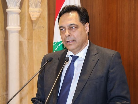 Prime Minister-designate Hassan Diab gives a statement following his meeting with outgoing prime Minister Saad Hariri in Beirut on December 20, 2019.