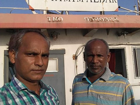 Sailors Vikash Mishra (left) and Arsu Lobo on board M V Tamim Aldar