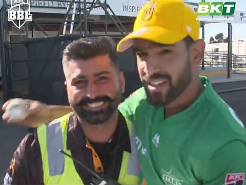 Haris Rauf (right) is seen with the Indian security guard after the match.