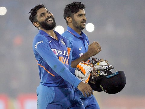 India's Ravindra Jadeja and Shardul Thakur after winning the third and the final ODI of the series against West Indies at Barabati Stadium in Cuttack on Sunday.