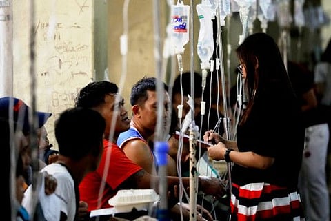 Patients poisoned after drinking coconut wine are treated at an emergency ward in Philippine General Hospital, in Manila, Philippines on Monday.