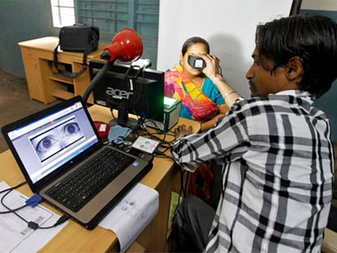 File picture of a woman registering for the Aadhar identity card in New Delhi. A governmental public notice was issued last week calling for linking an Indian resident’s PAN with his/her Aadhaar card before 2019 ends.