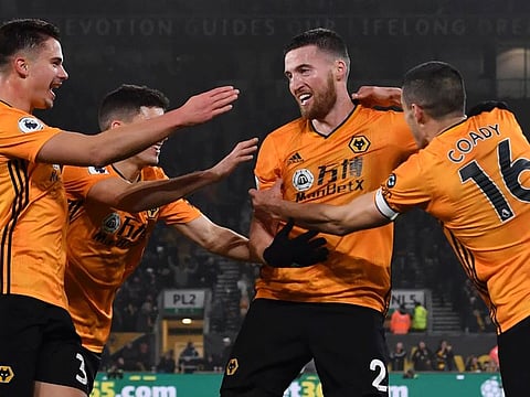 Wolverhampton Wanderers are ecstatic after scoring one of their goals during their 3-2 shock win over champions Manchester City on Friday.